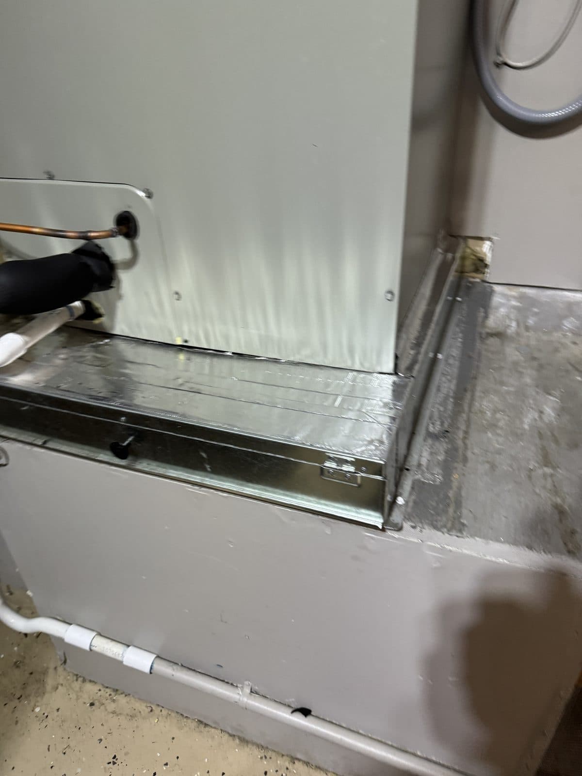 Air handler coil housing where the AccuClean filtration unit installs