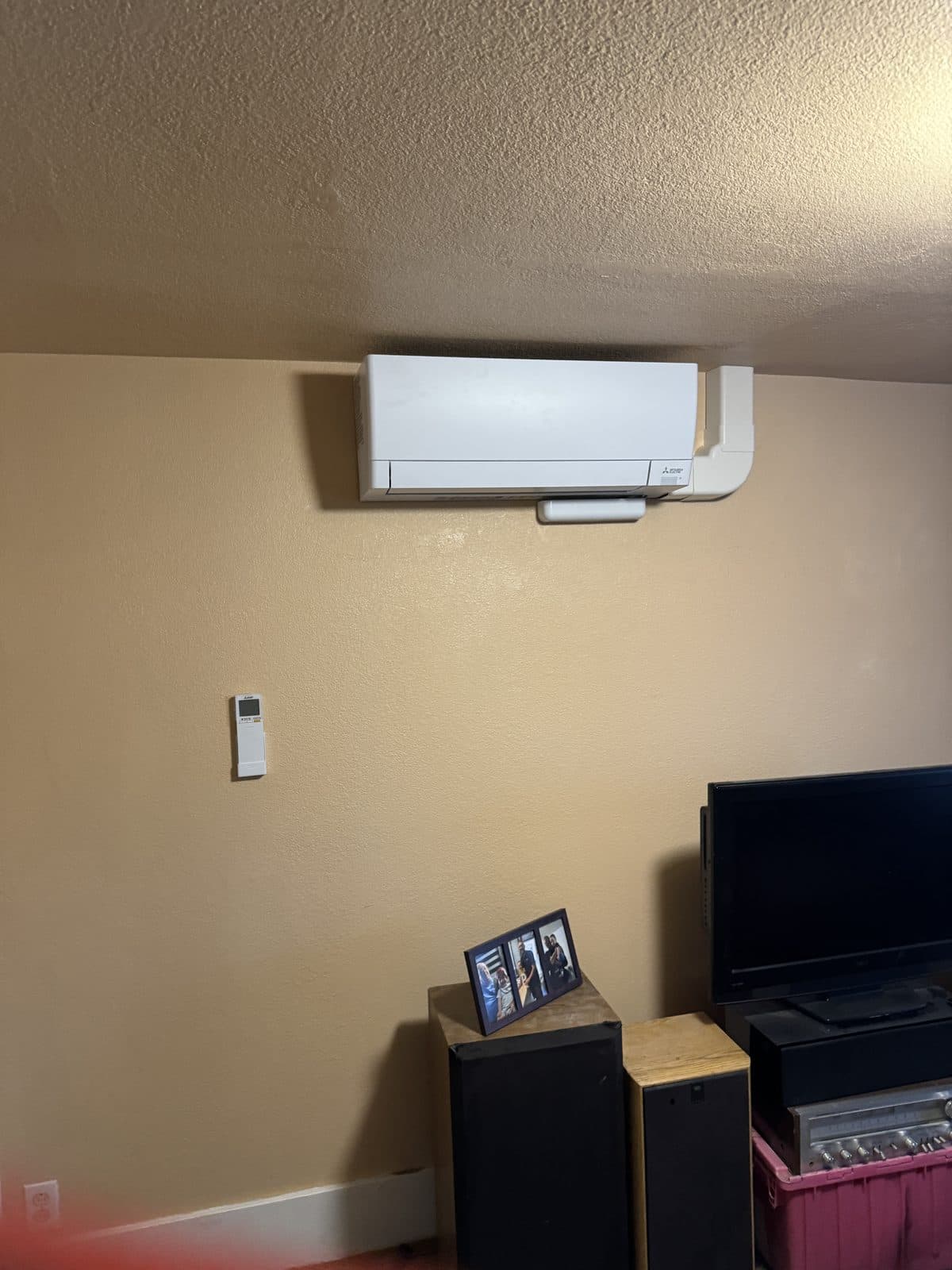 Ductless mini-split indoor wall-mounted head unit with remote