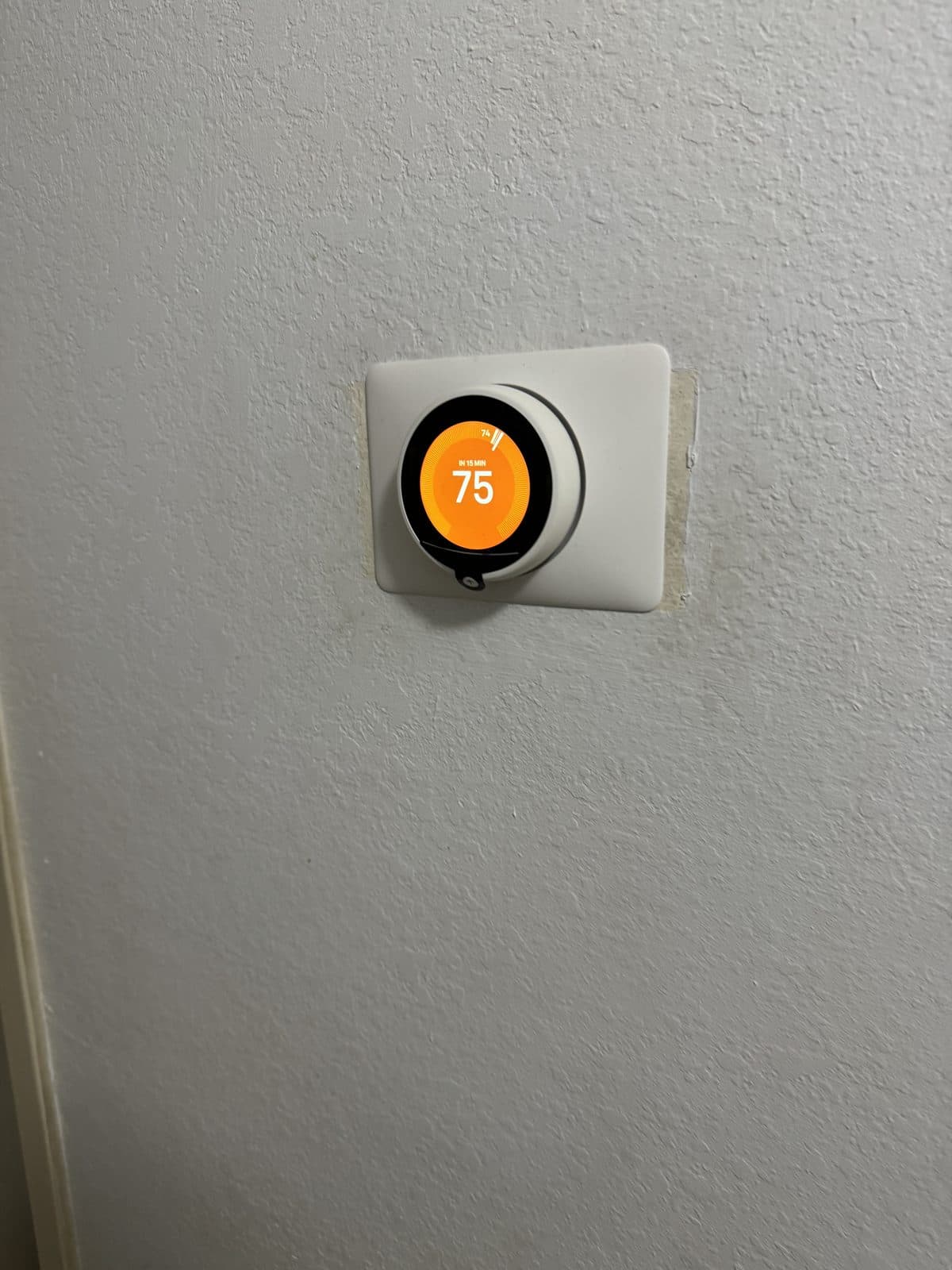 Nest smart thermostat set to 75 degrees