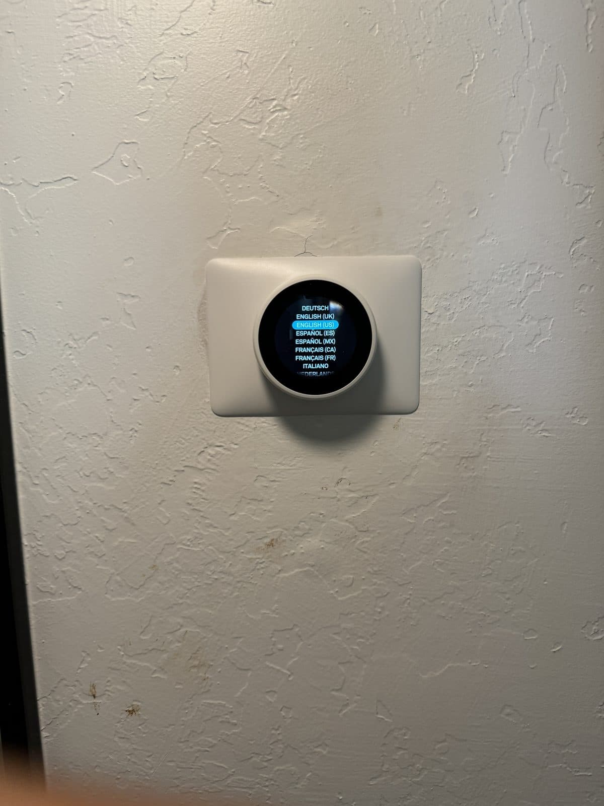 Smart thermostat showing diagnostic menu screen